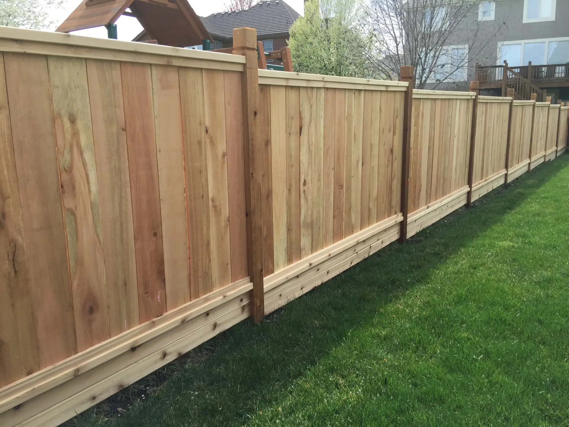 Solid old style picture frame wood fence Kansas City