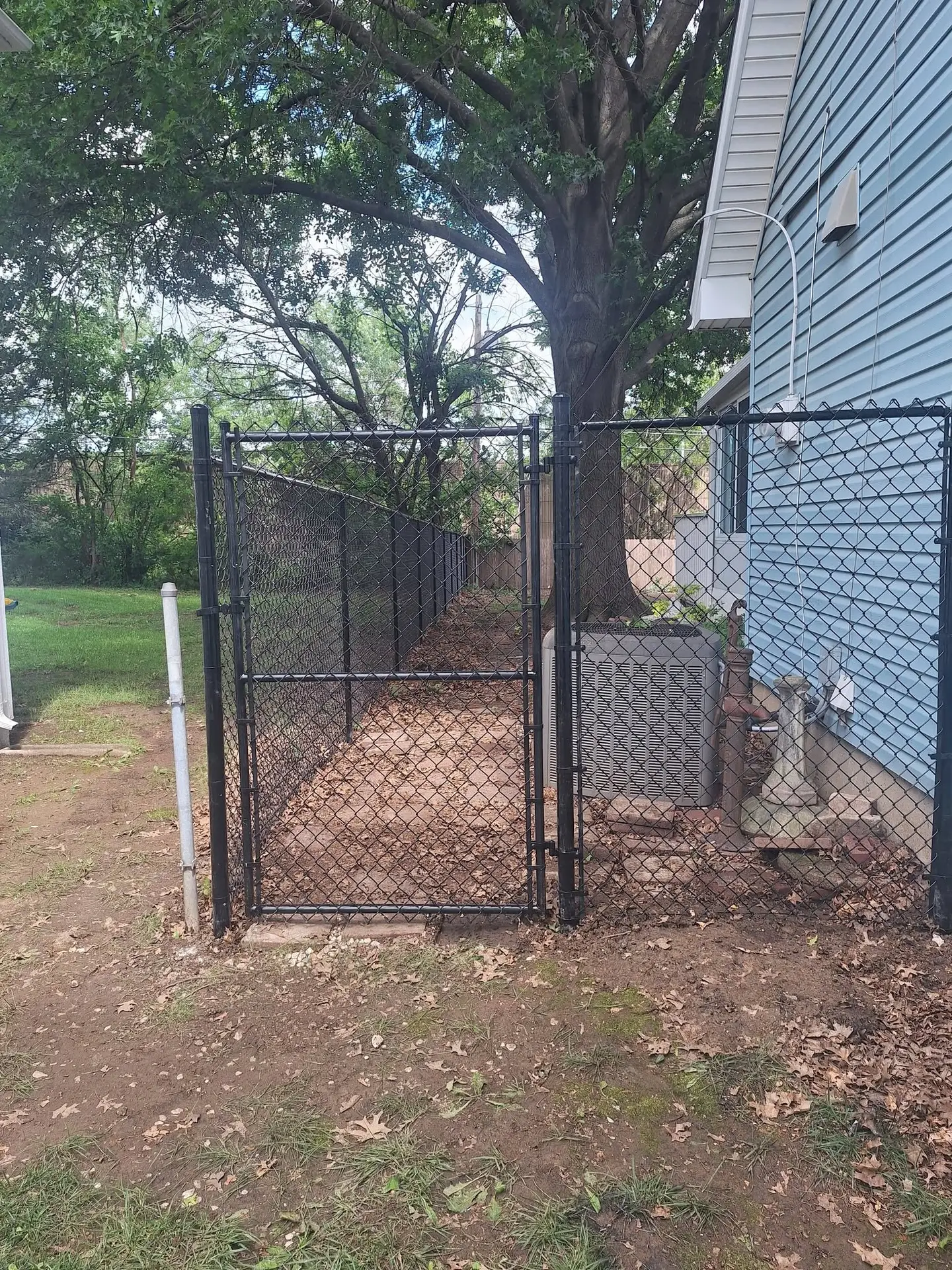 Black chain link gate Kansas City by Pride Fence KC