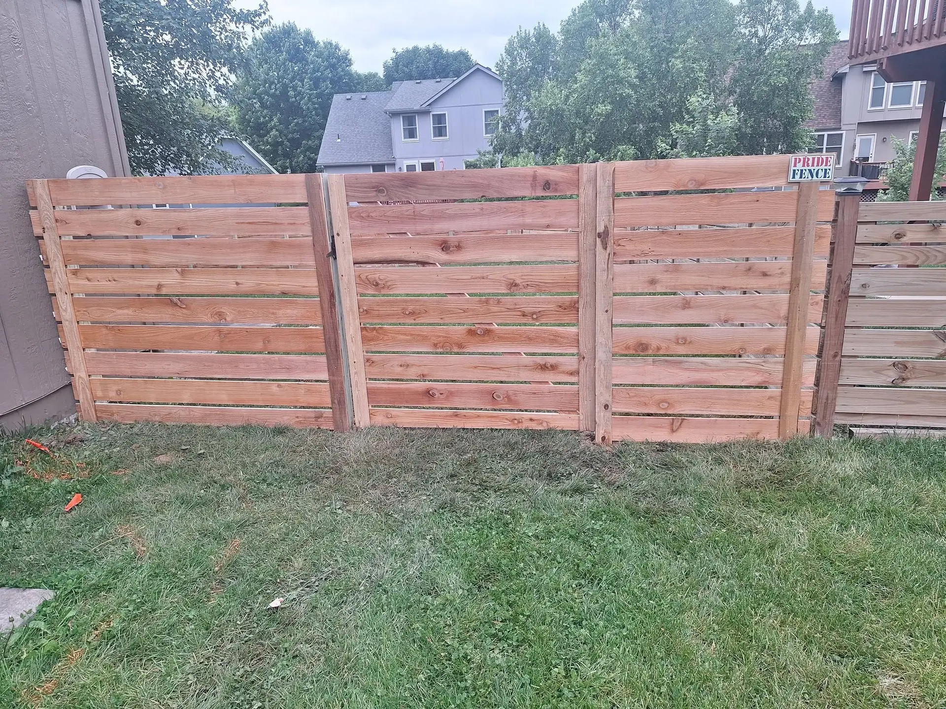Horizontal spaced cedar wood fence Kansas City by Pride Fence KC