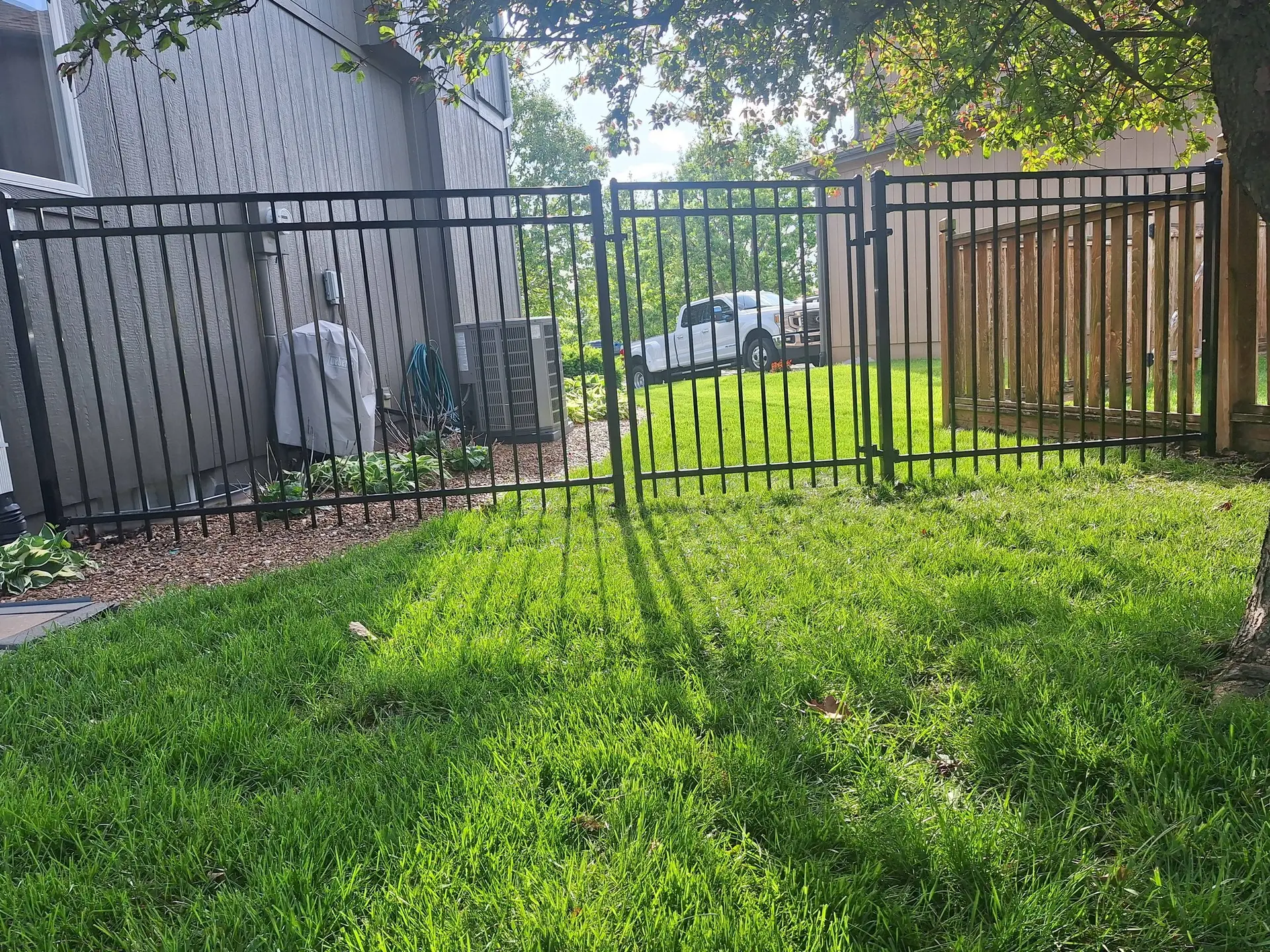 Ornamental steel fence at sunset Kansas City by Pride Fence KC